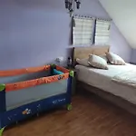 Acogedor En *